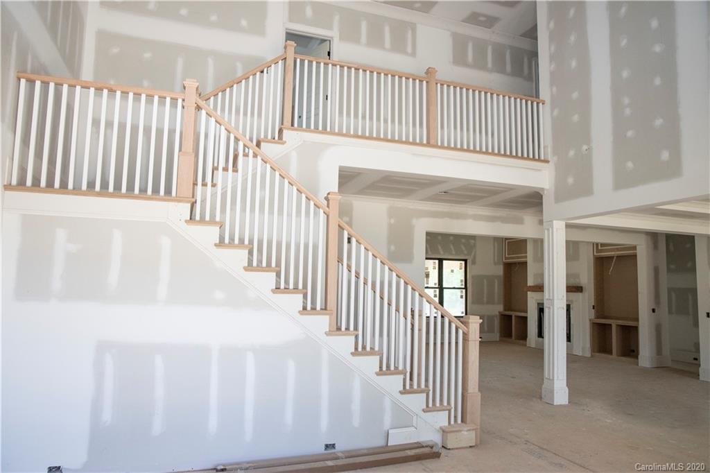 2012 Connonade Drive Waxhaw, NC 28173 - Photo 6 of 10 a view of a porch with wooden floor and windows