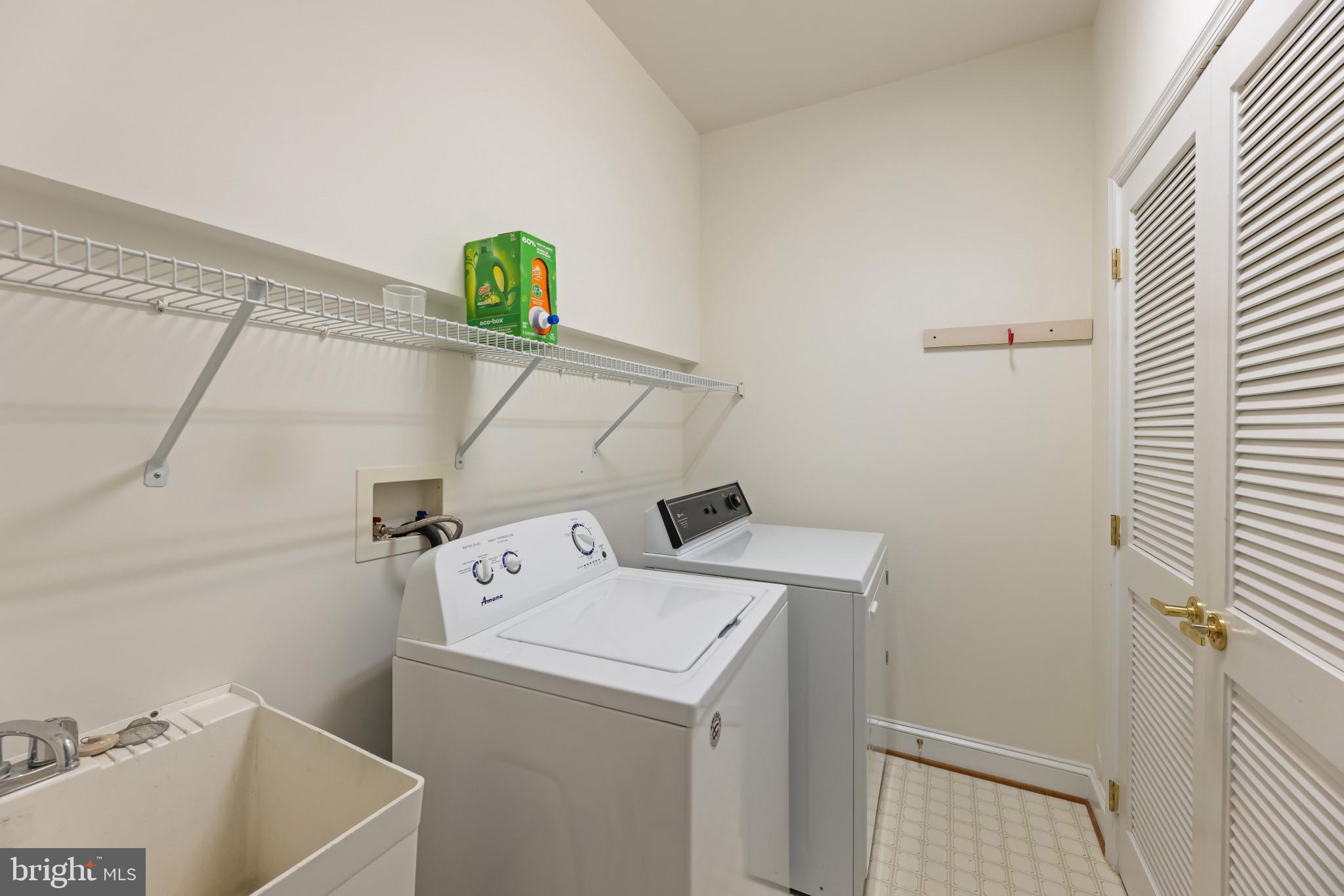6934 Cumberstone Place Gainesville, VA 20155 - Photo 23 of 49 a utility room with dryer and washer