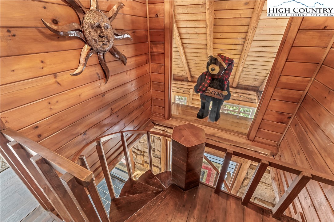 231 Deer Oaks Road Deep Gap, NC 28618 - Photo 19 of 44 a view of a balcony with chairs