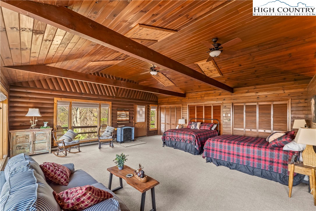 231 Deer Oaks Road Deep Gap, NC 28618 - Photo 27 of 44 a living room with furniture