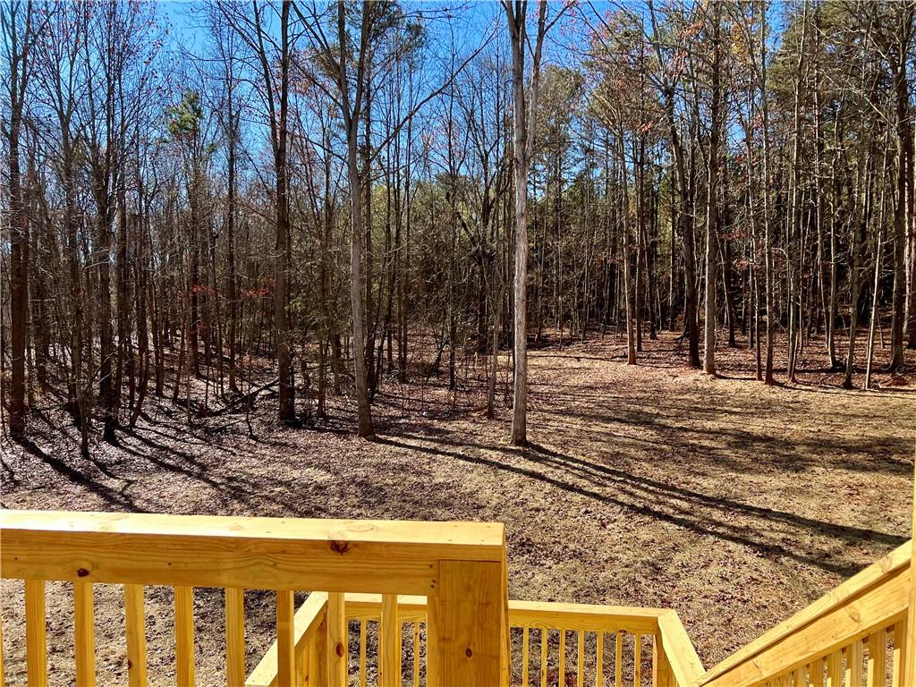 327 Primrose Lane Pendergrass, GA 30567 - Photo 34 of 41 a view of a backyard of the house
