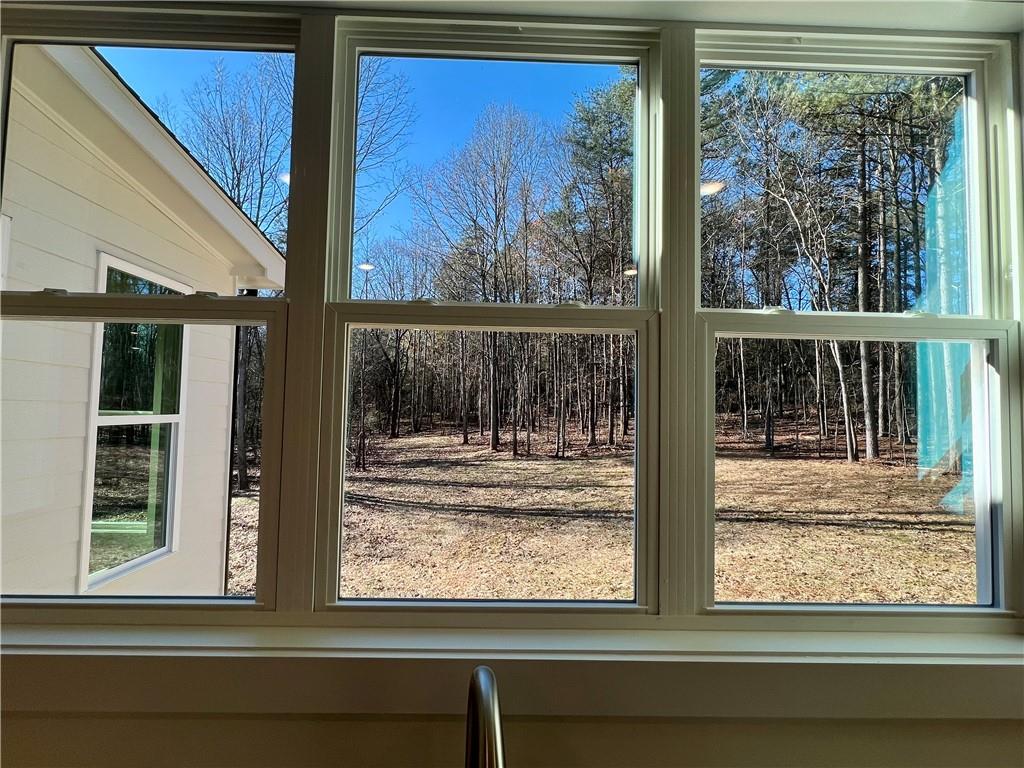 327 Primrose Lane Pendergrass, GA 30567 - Photo 7 of 41 a view of a door and a window
