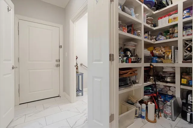 a view of a room with shelves