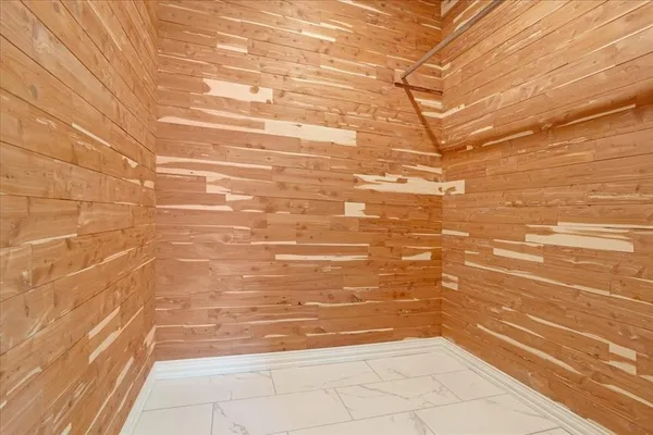 a bathroom with bathtub and shower