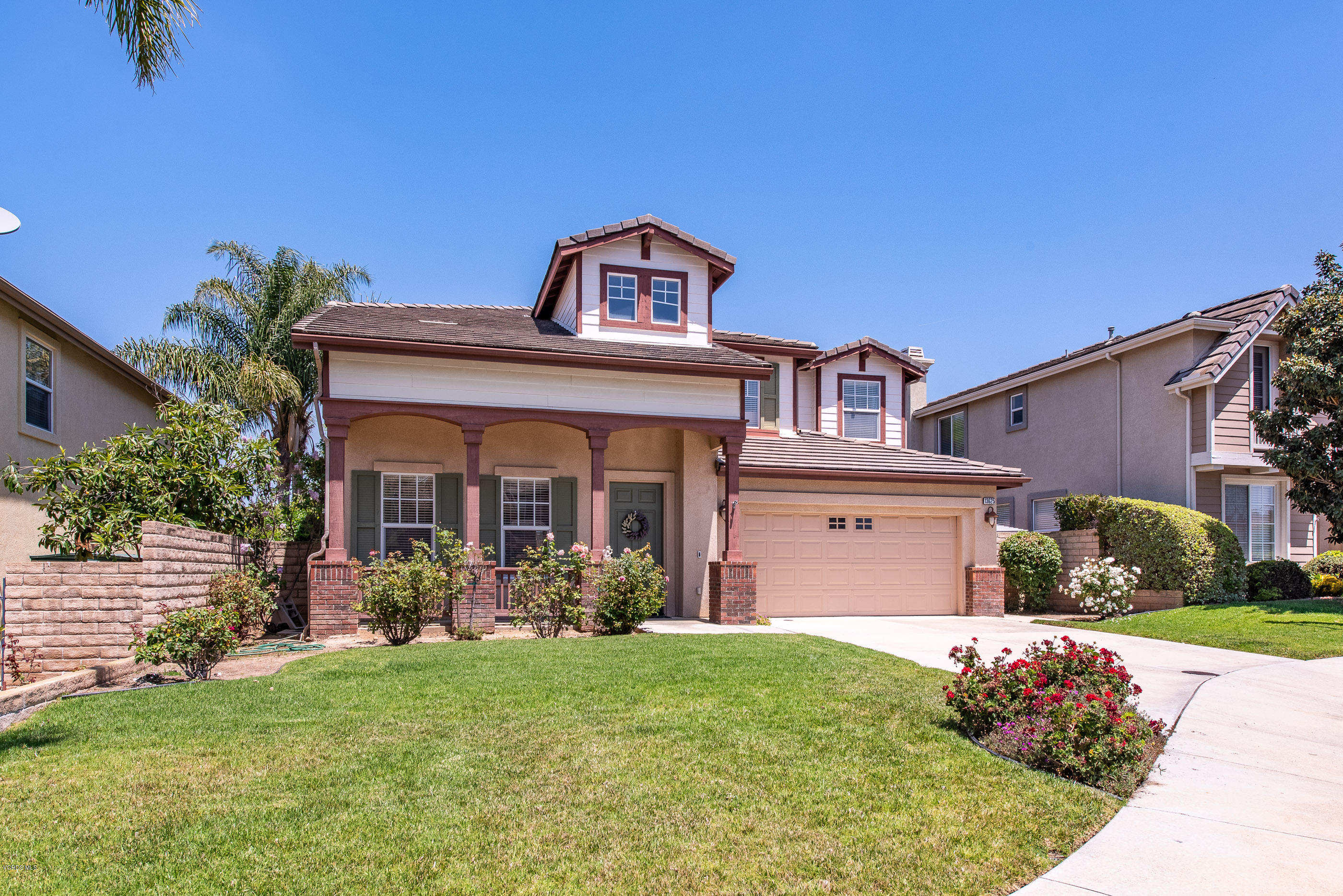13625 Silver Oak Lane Moorpark, CA 93021 - Photo 2 of 35 front view of a house with a yard