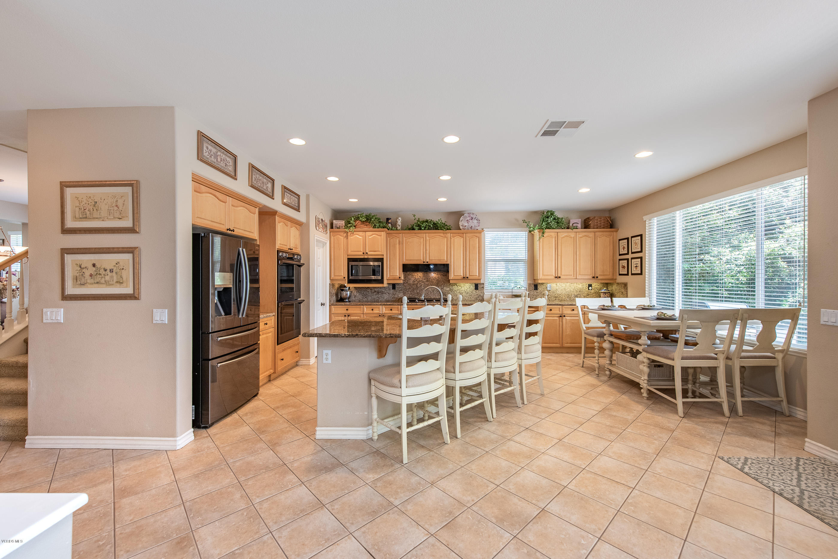 13625 Silver Oak Lane Moorpark, CA 93021 - Photo 11 of 35 a view of a dining room with furniture window and outside view