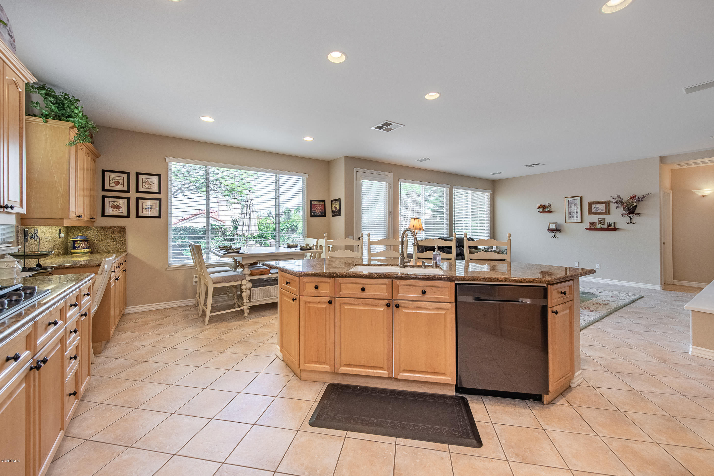 13625 Silver Oak Lane Moorpark, CA 93021 - Photo 14 of 35 a large kitchen with stainless steel appliances lots of counter top space