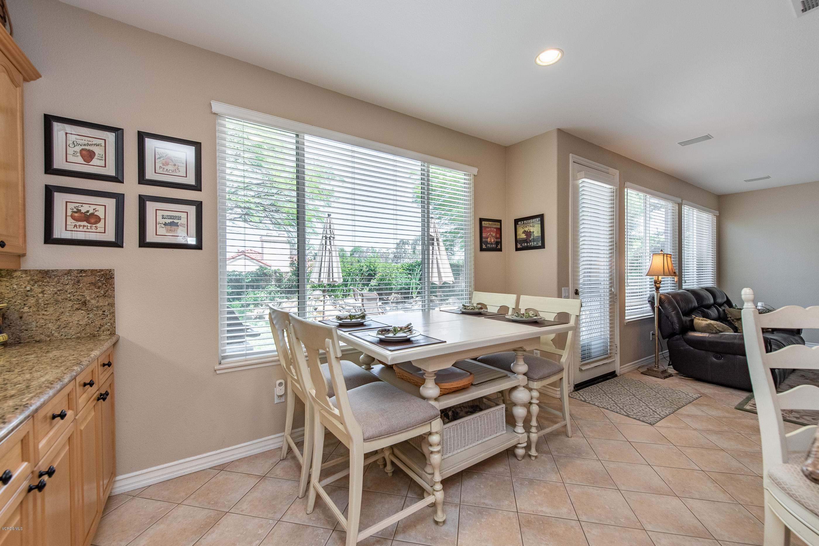 13625 Silver Oak Lane Moorpark, CA 93021 - Photo 15 of 35 a dining room with furniture and windows