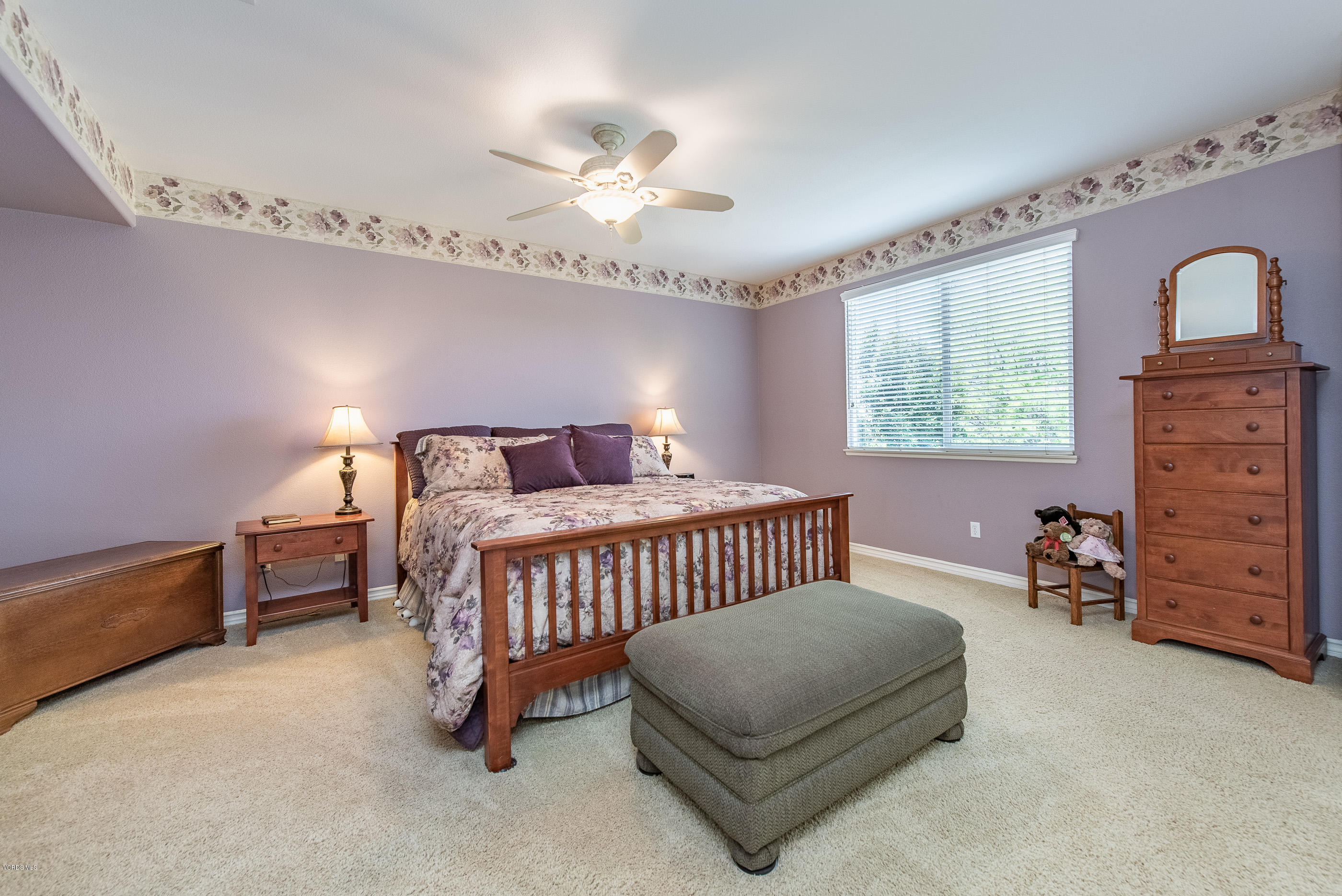 13625 Silver Oak Lane Moorpark, CA 93021 - Photo 21 of 35 a bedroom with a bed and a dresser