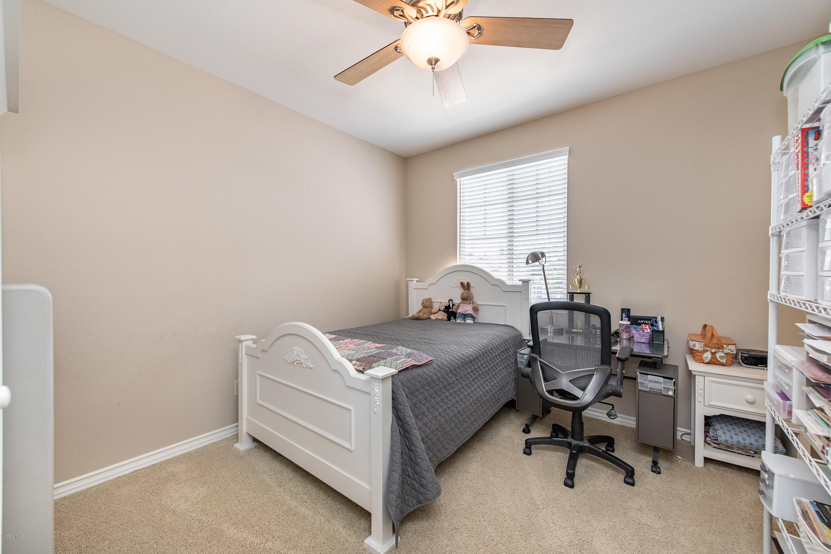13625 Silver Oak Lane Moorpark, CA 93021 - Photo 26 of 35 a bedroom with bed and a window