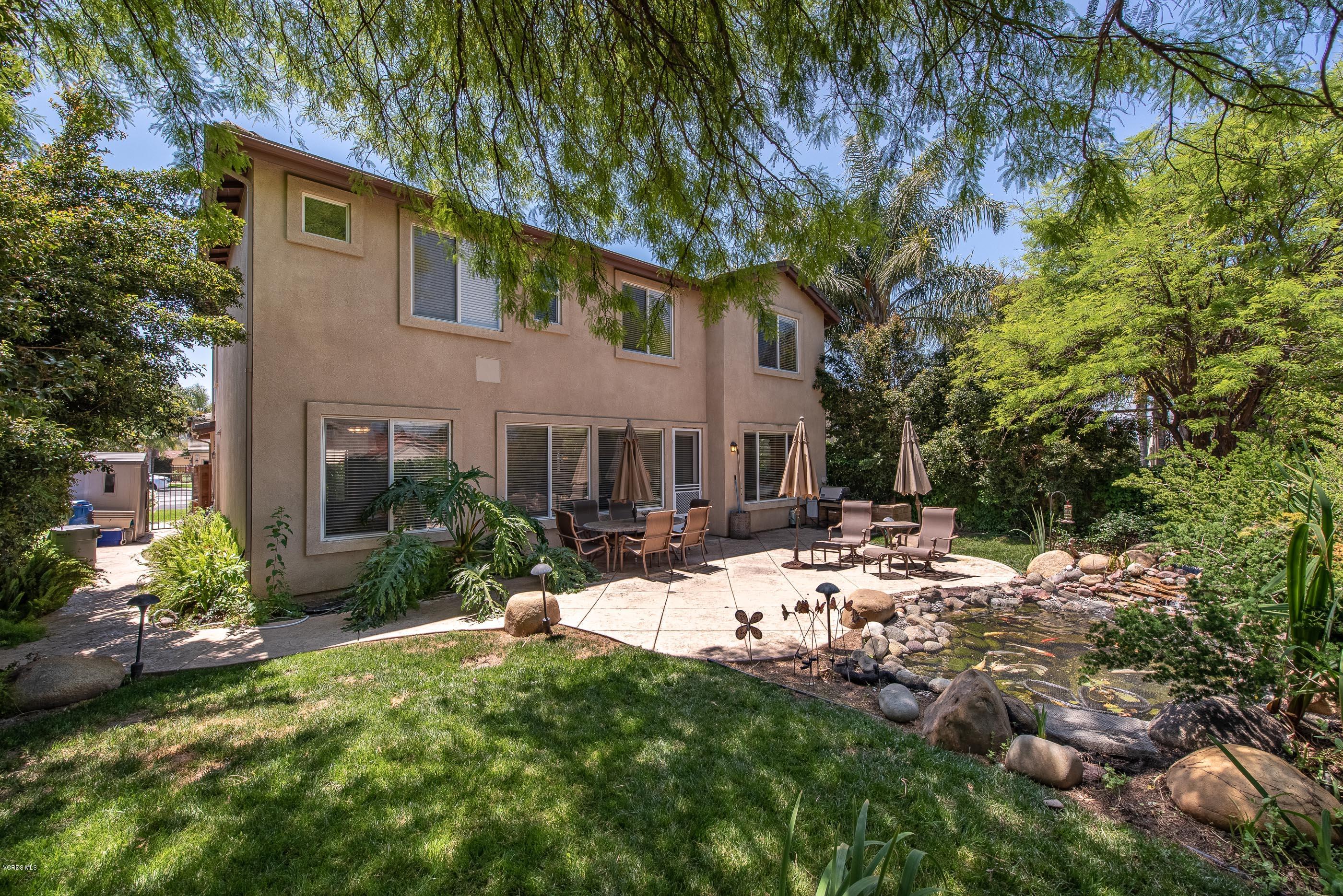 13625 Silver Oak Lane Moorpark, CA 93021 - Photo 31 of 35 a view of a house with a yard