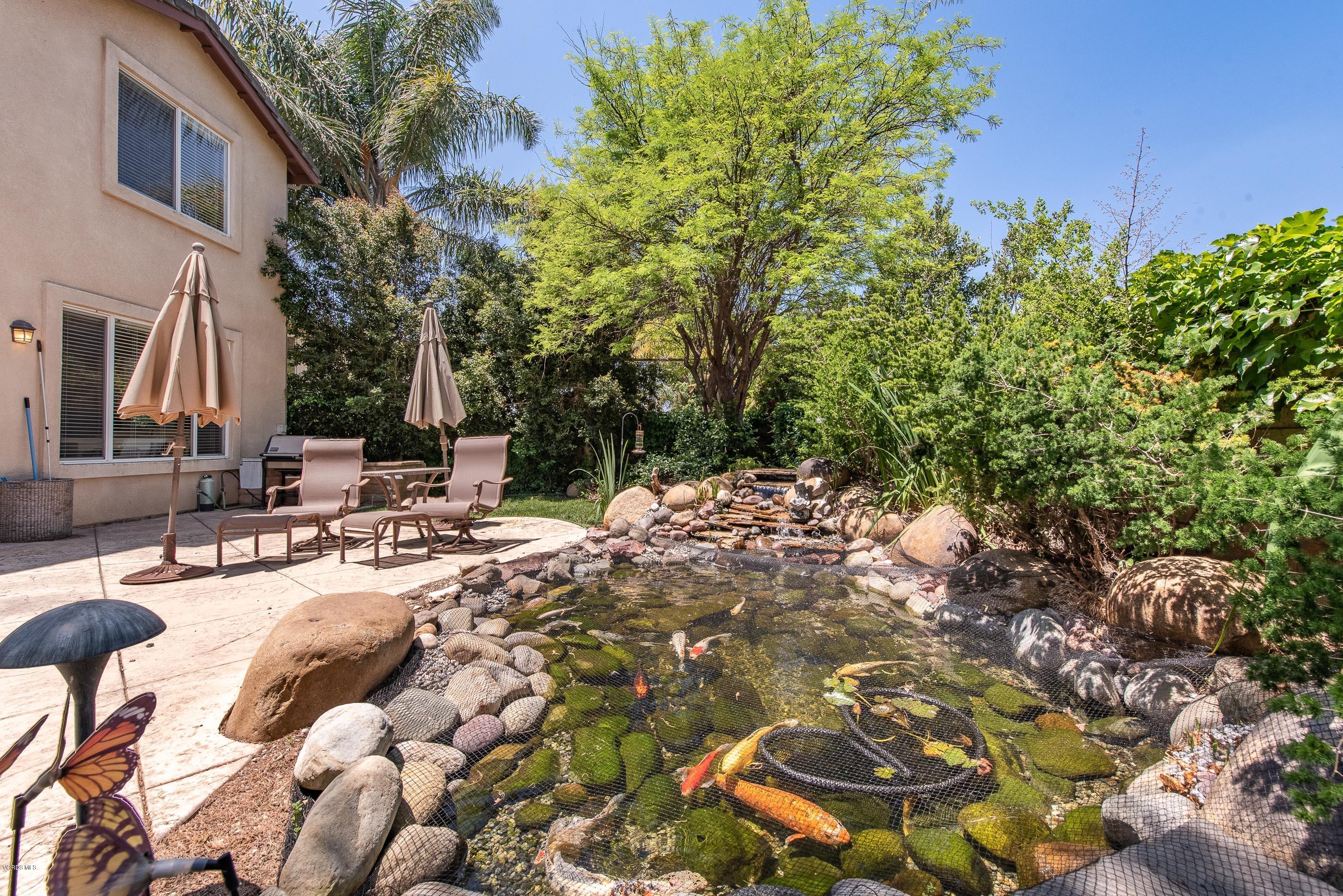 13625 Silver Oak Lane Moorpark, CA 93021 - Photo 33 of 35 a view of swimming pool with lawn chairs and plants