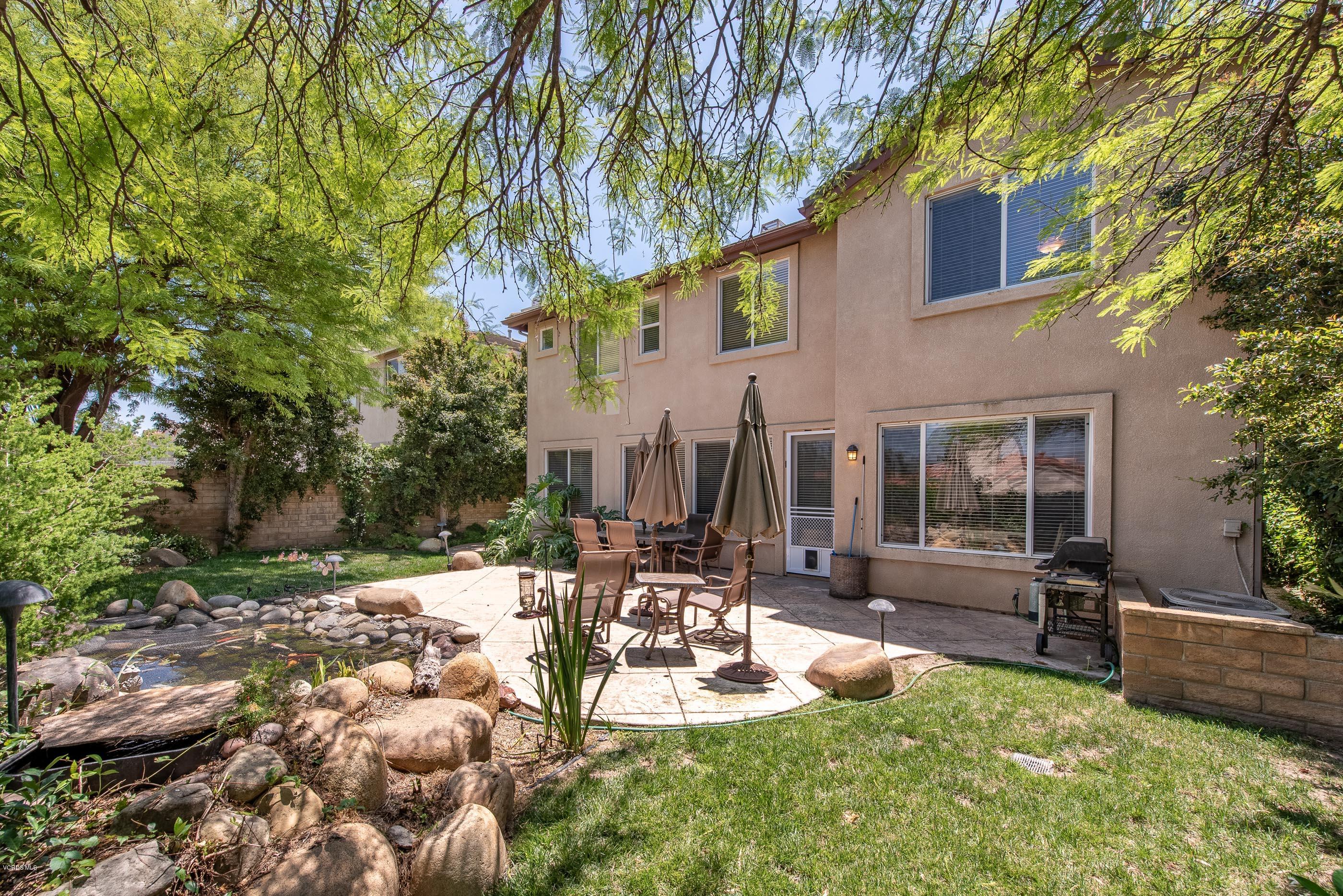 13625 Silver Oak Lane Moorpark, CA 93021 - Photo 34 of 35 a view of a backyard with a patio