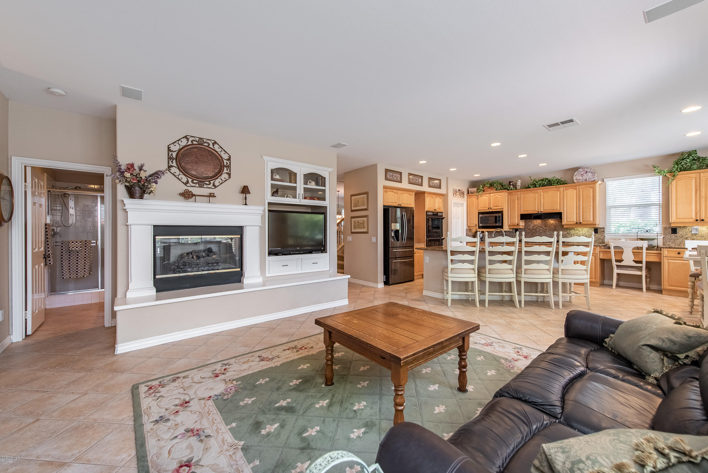 13625 Silver Oak Lane Moorpark, CA 93021 - Photo 10 of 35 a living room with furniture and a fireplace