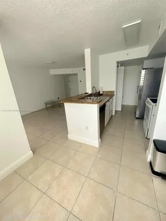 a large bathroom with a sink a vanity and a mirror