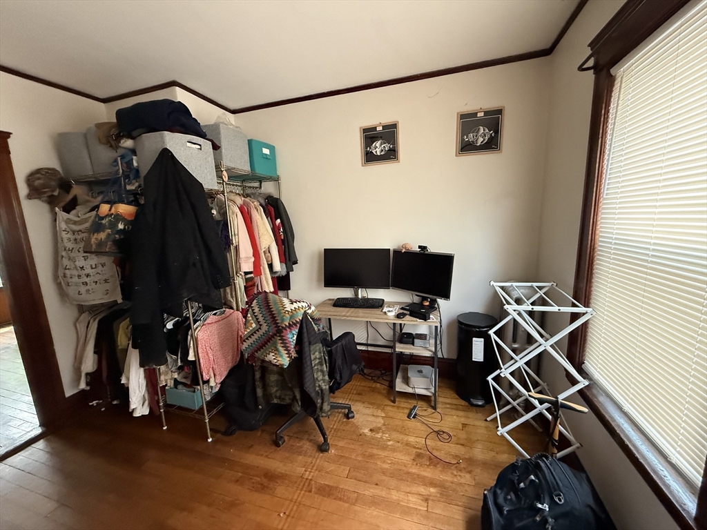29 Lewis Street, Unit 1 Somerville, MA 02143 - Photo 12 of 16 a view of a room with gym equipment