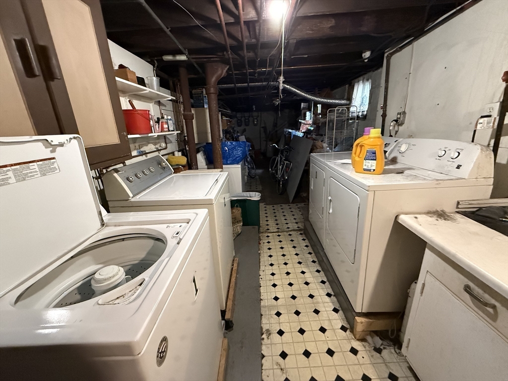 29 Lewis Street, Unit 1 Somerville, MA 02143 - Photo 15 of 16 a utility room with dryer and washer