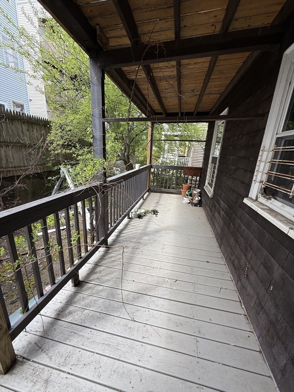 29 Lewis Street, Unit 1 Somerville, MA 02143 - Photo 16 of 16 a view of outdoor space with wooden floor