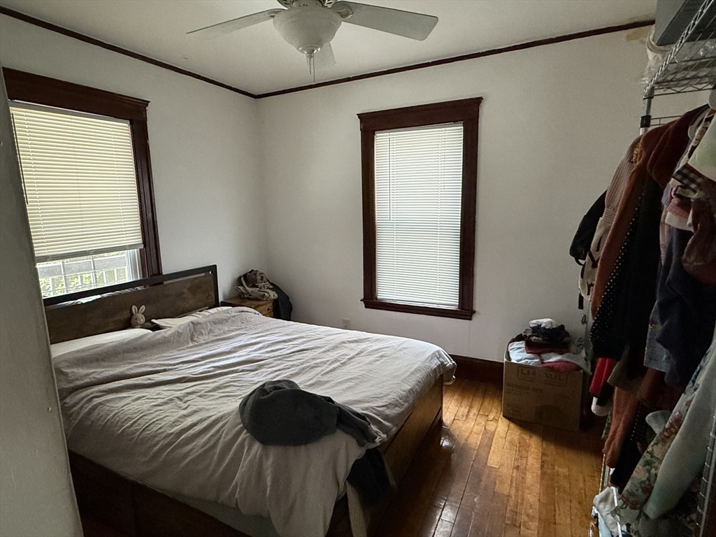 29 Lewis Street, Unit 1 Somerville, MA 02143 - Photo 8 of 16 a bedroom with a bed and a window