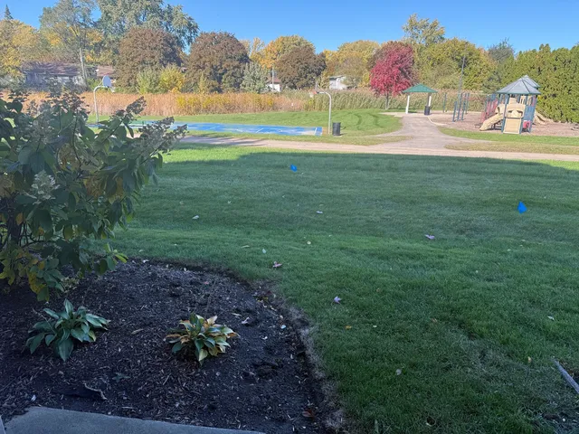 a view of lake with green space