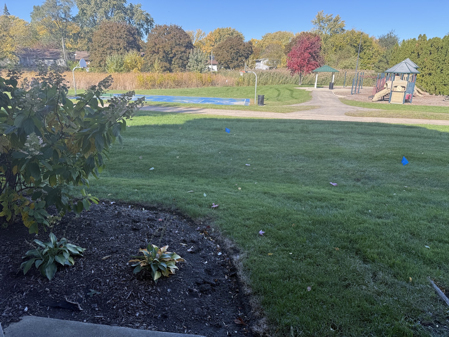 1319 Kingsbury Drive, Unit 2 Hanover Park, IL 60133 - Photo 16 of 44 a view of lake with green space