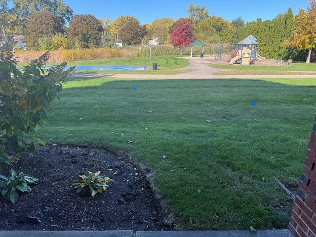 a view of a lake with a yard