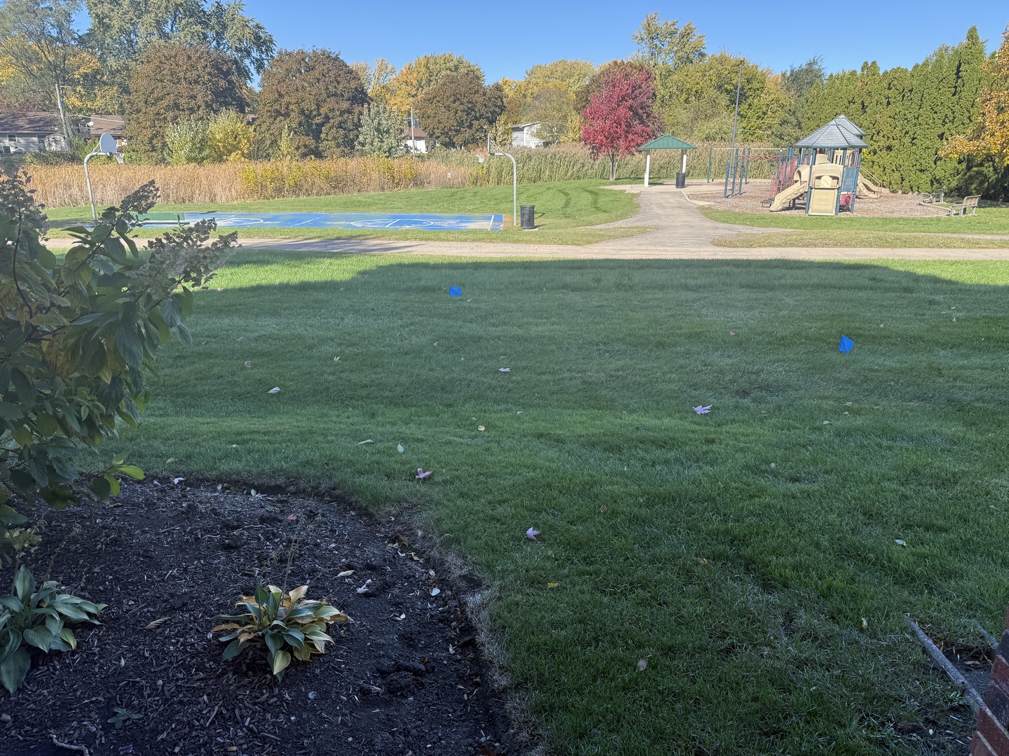 1319 Kingsbury Drive, Unit 2 Hanover Park, IL 60133 - Photo 21 of 44 a view of an outdoor space and a yard
