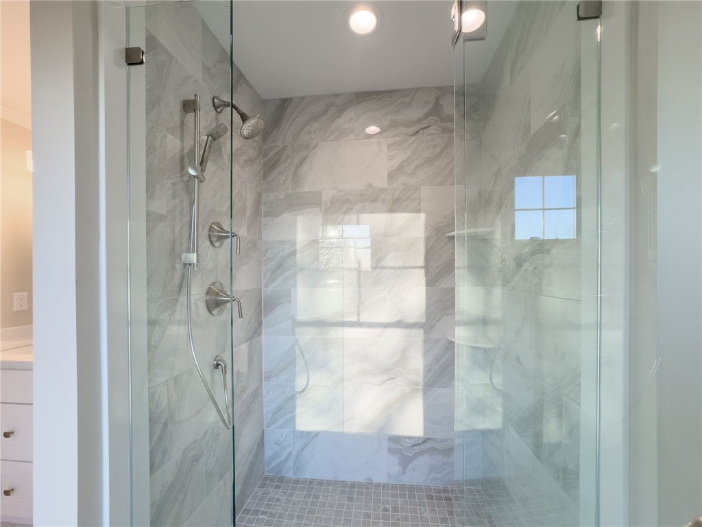 25 Scallop Shell Road Narragansett, RI 02882 - Photo 20 of 49 View of primary shower. Photos don't do justice to the gorgeous marble-look tile!