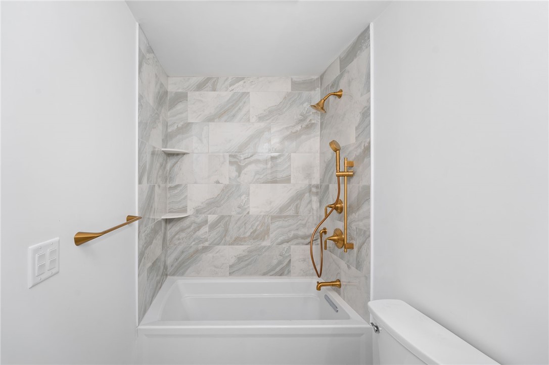 25 Scallop Shell Road Narragansett, RI 02882 - Photo 24 of 49 Level 3 full bath with tub is conveniently located between Bedrooms 2 and 3