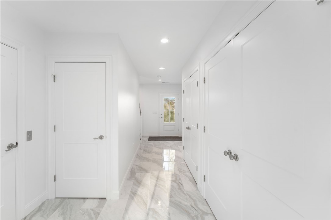 25 Scallop Shell Road Narragansett, RI 02882 - Photo 32 of 49 View towards front of the house when entering from back slider