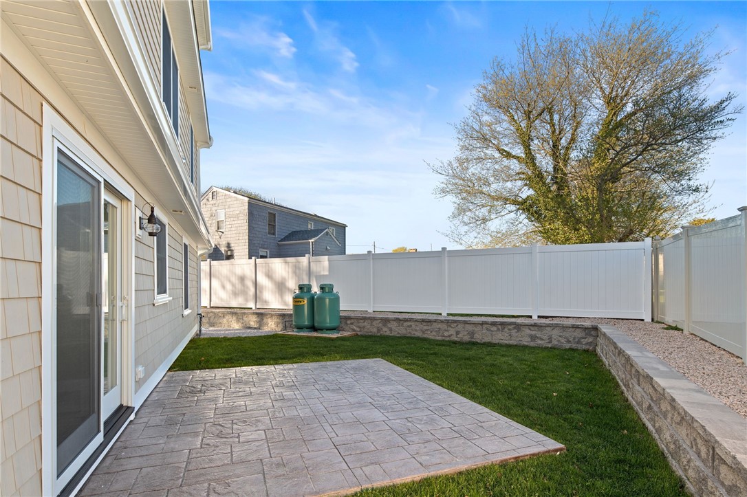 25 Scallop Shell Road Narragansett, RI 02882 - Photo 38 of 49 Tidy and easy care stamped concrete private patio