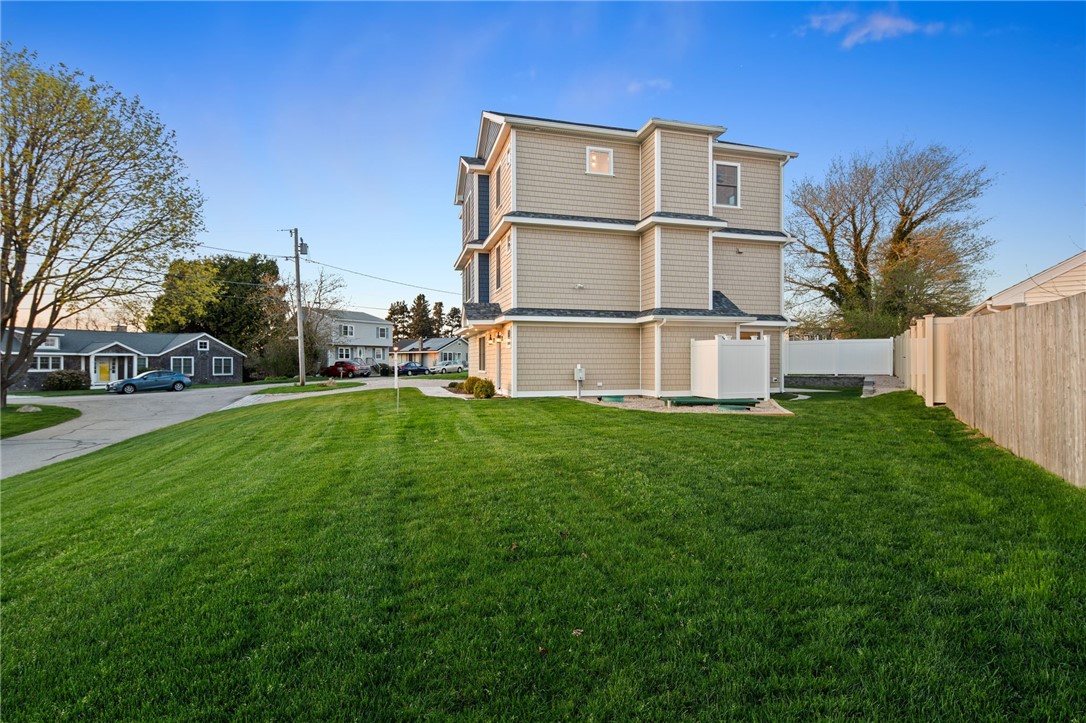 25 Scallop Shell Road Narragansett, RI 02882 - Photo 41 of 49 Lush green lawn is spacious enough for family and friends lawn games!