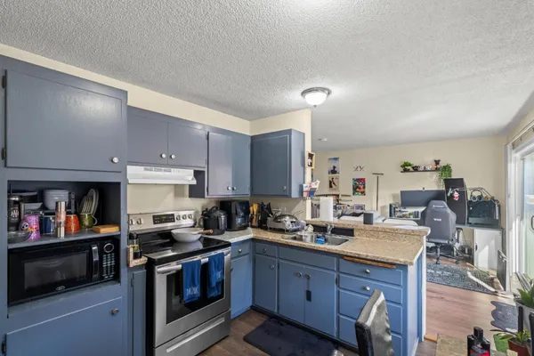 a bedroom with a workspace