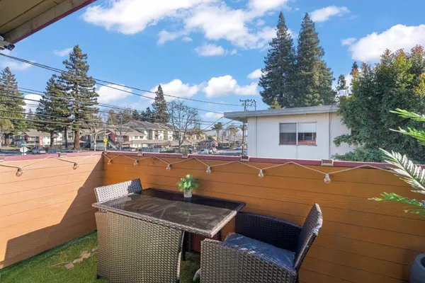 a view of swimming pool with outdoor seating