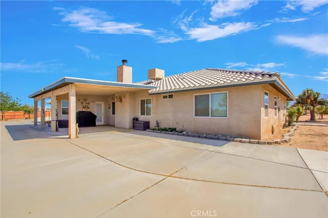 a view of a house with a patio