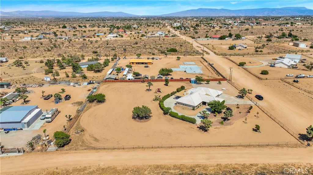 7330 Smoke Tree Road Phelan, CA 92371 - Photo 39 of 46 an aerial view of residential houses with outdoor space
