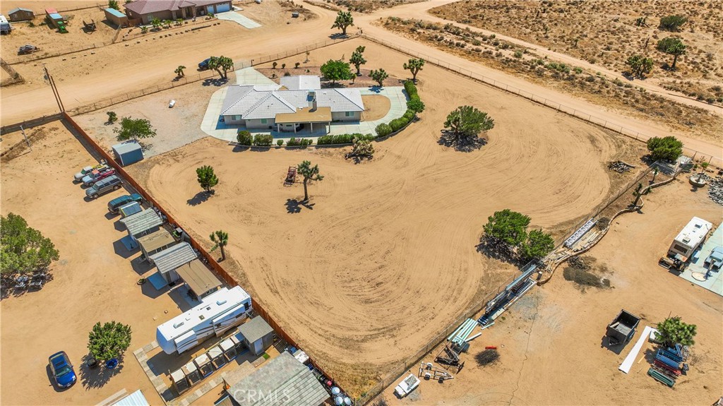 7330 Smoke Tree Road Phelan, CA 92371 - Photo 41 of 46 an aerial view of a house with a swimming pool