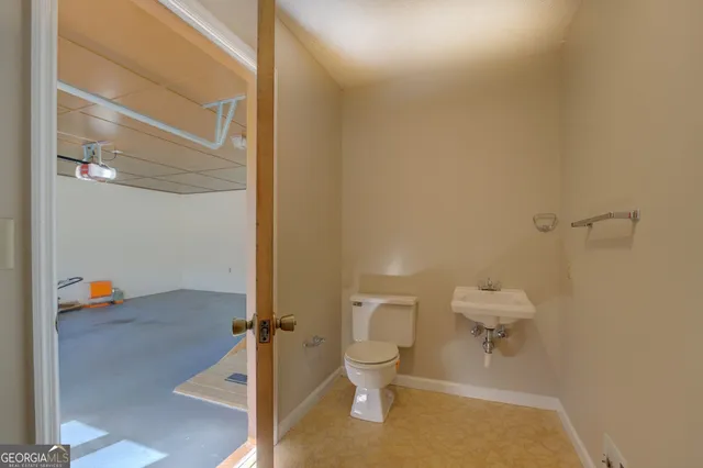 a balcony with wooden floor and outdoor space