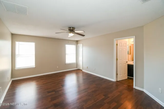 a kitchen with a stove a sink and a refrigerator