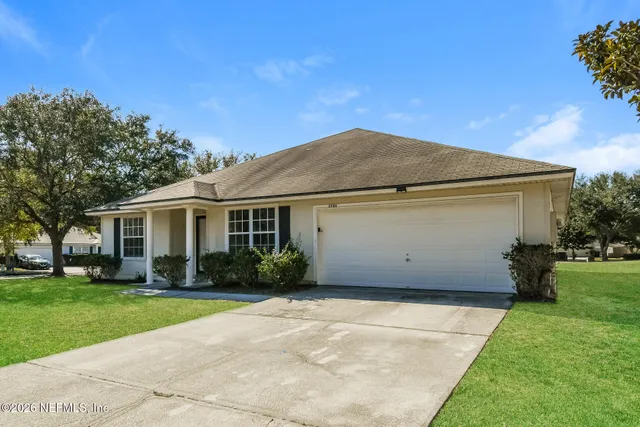 a view of a house with a garden