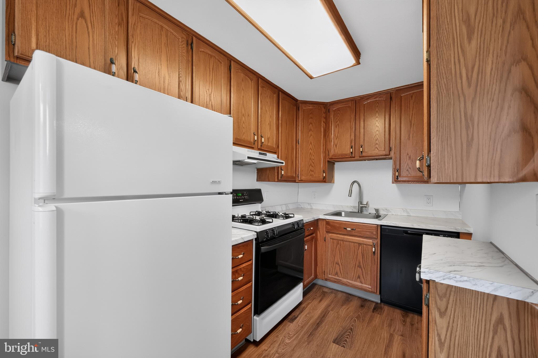 256 Cambridge Road Clifton Heights, PA 19018 - Photo 14 of 30 Cozy kitchen with warm wood accents.