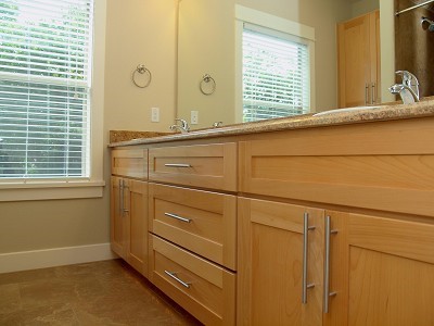 304 Zennia Street Austin, TX 78751 - Photo 15 of 26 a bathroom with a sink and a mirror