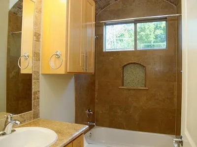 a bathroom with a sink and a mirror