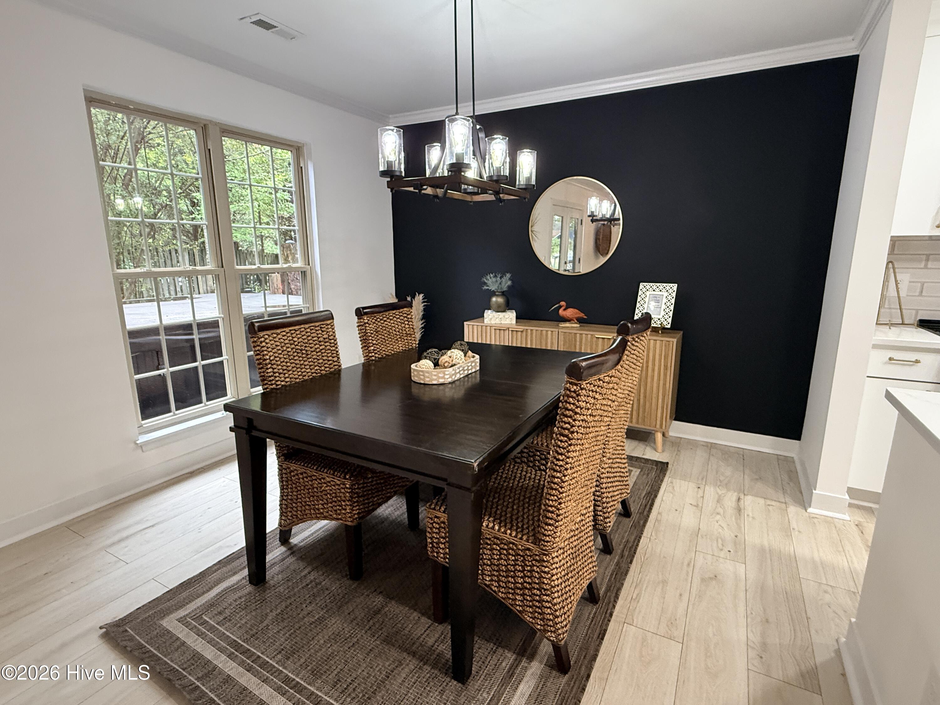 1001 Hunting Ridge Road Wilmington, NC 28412 - Photo 16 of 58 Black accent wall sets off the design!
