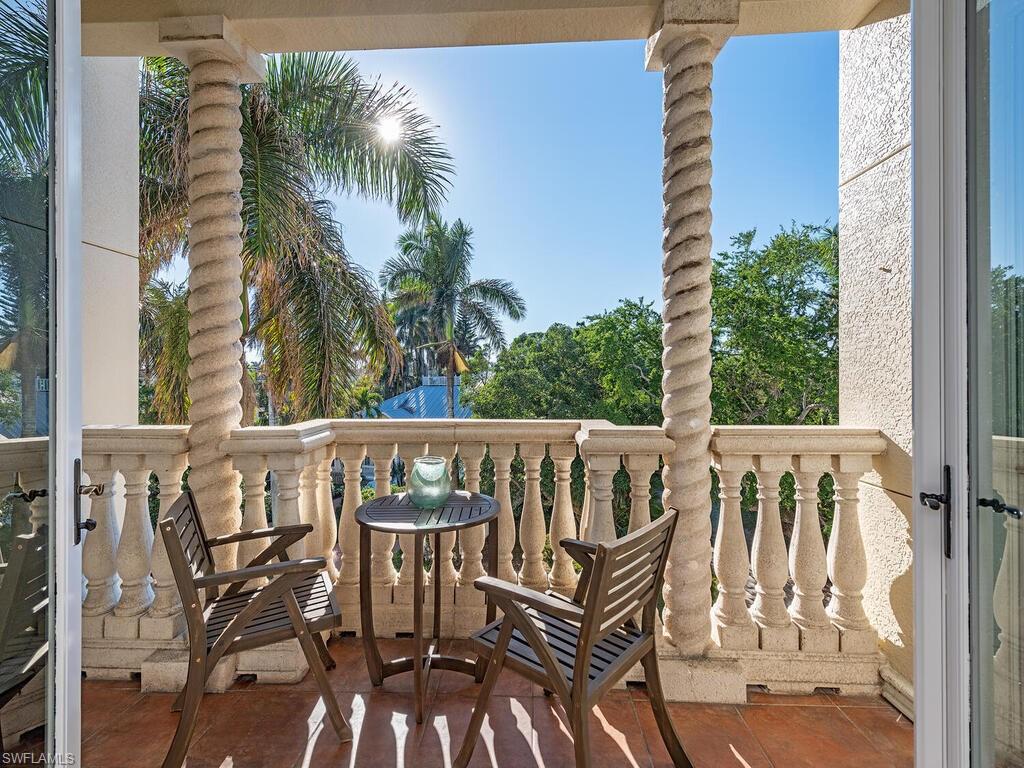 627 6th Avenue South, Unit B302 Naples, FL 34102 - Photo 11 of 14 a view of balcony with furniture
