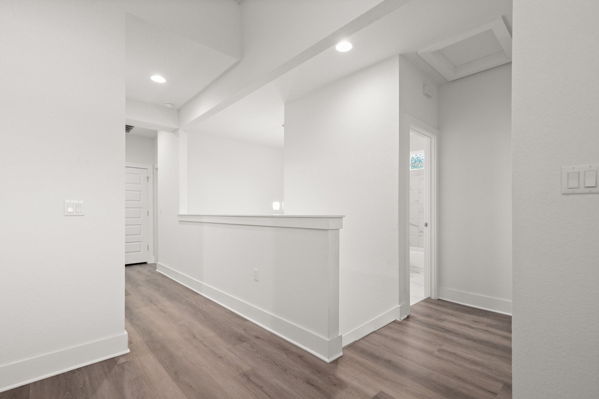 8922 Manchaca Road, Unit 701 Austin, TX 78748 - Photo 18 of 25 an empty room with wooden floor