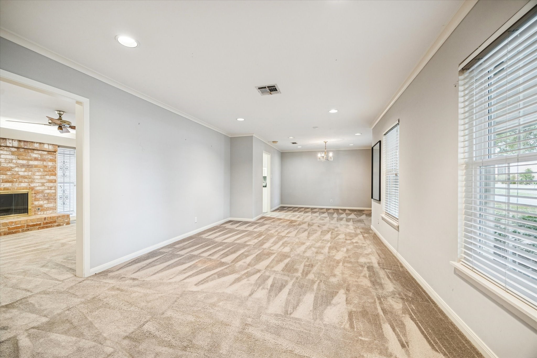 9022 Timberside Drive Houston, TX 77025 - Photo 2 of 10 a view of an empty room and window