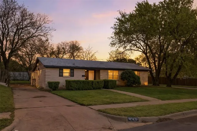 front view of house with a yard
