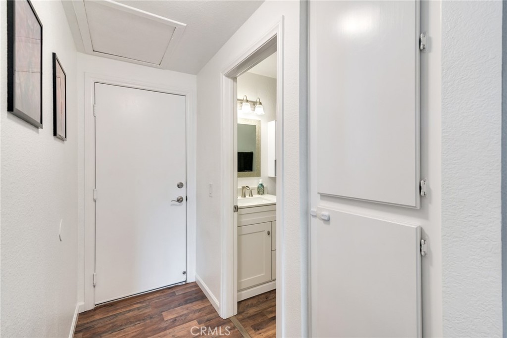 705 Fuchsia Lane Perris, CA 92571 - Photo 15 of 29 a view of walk in closet with wooden floor
