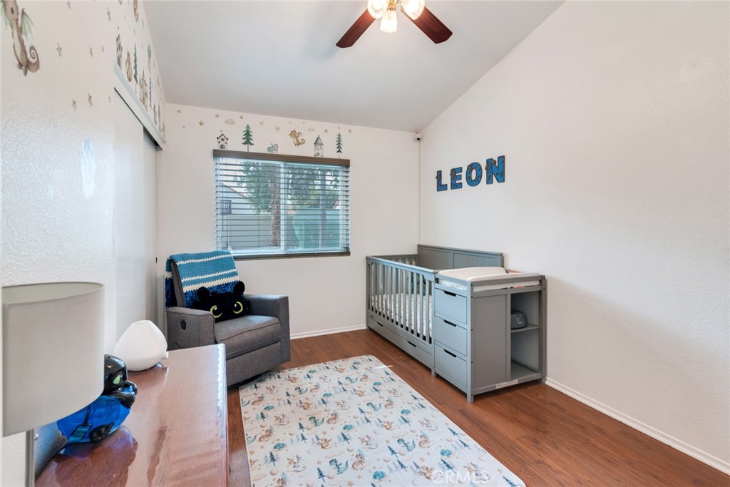 705 Fuchsia Lane Perris, CA 92571 - Photo 6 of 29 a living room with furniture and a window